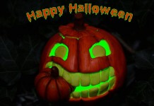 Happy Halloween 2014 Kürbis ausgehölt mit grünem Laserlicht angestrahlt